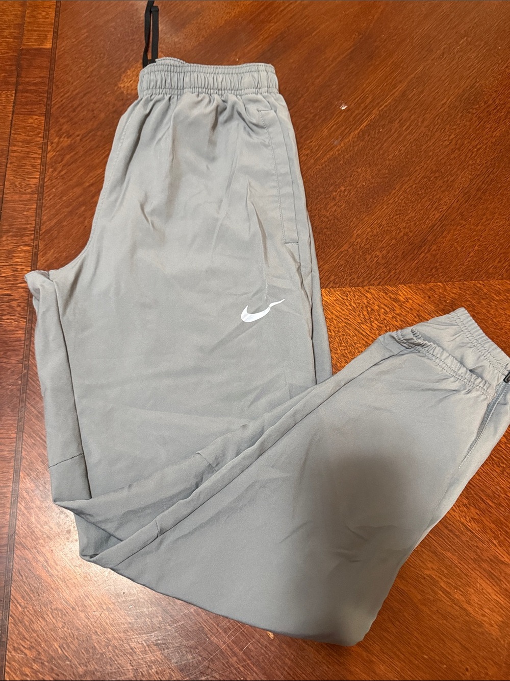 Nike Men's Gray Jogger Sweatpants with White Swoosh